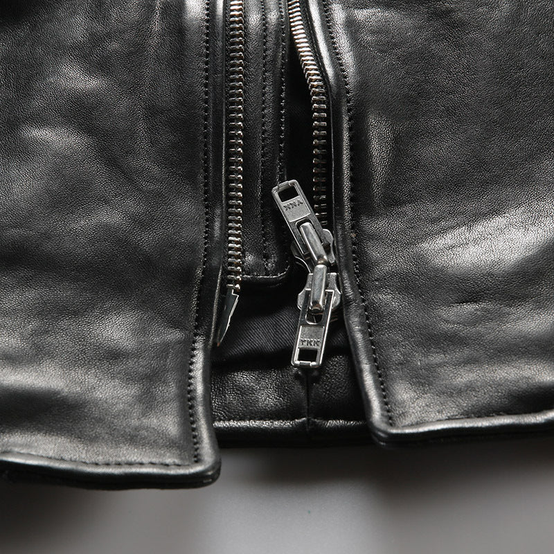 Men's vintage washed genuine leather jacket with stand-up collar made of vegetable-tanned sheepskin.